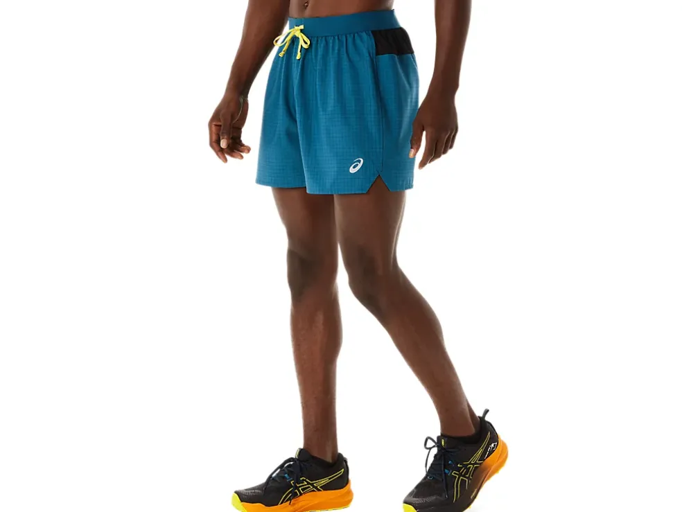 Shop ASICS MEN FUJITRAIL LOGO SHORT Ink Teal/Golden Yellow