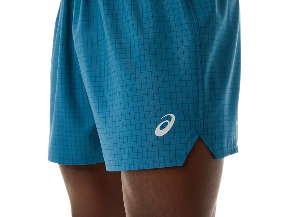 Shop ASICS MEN FUJITRAIL LOGO SHORT Ink Teal/Golden Yellow